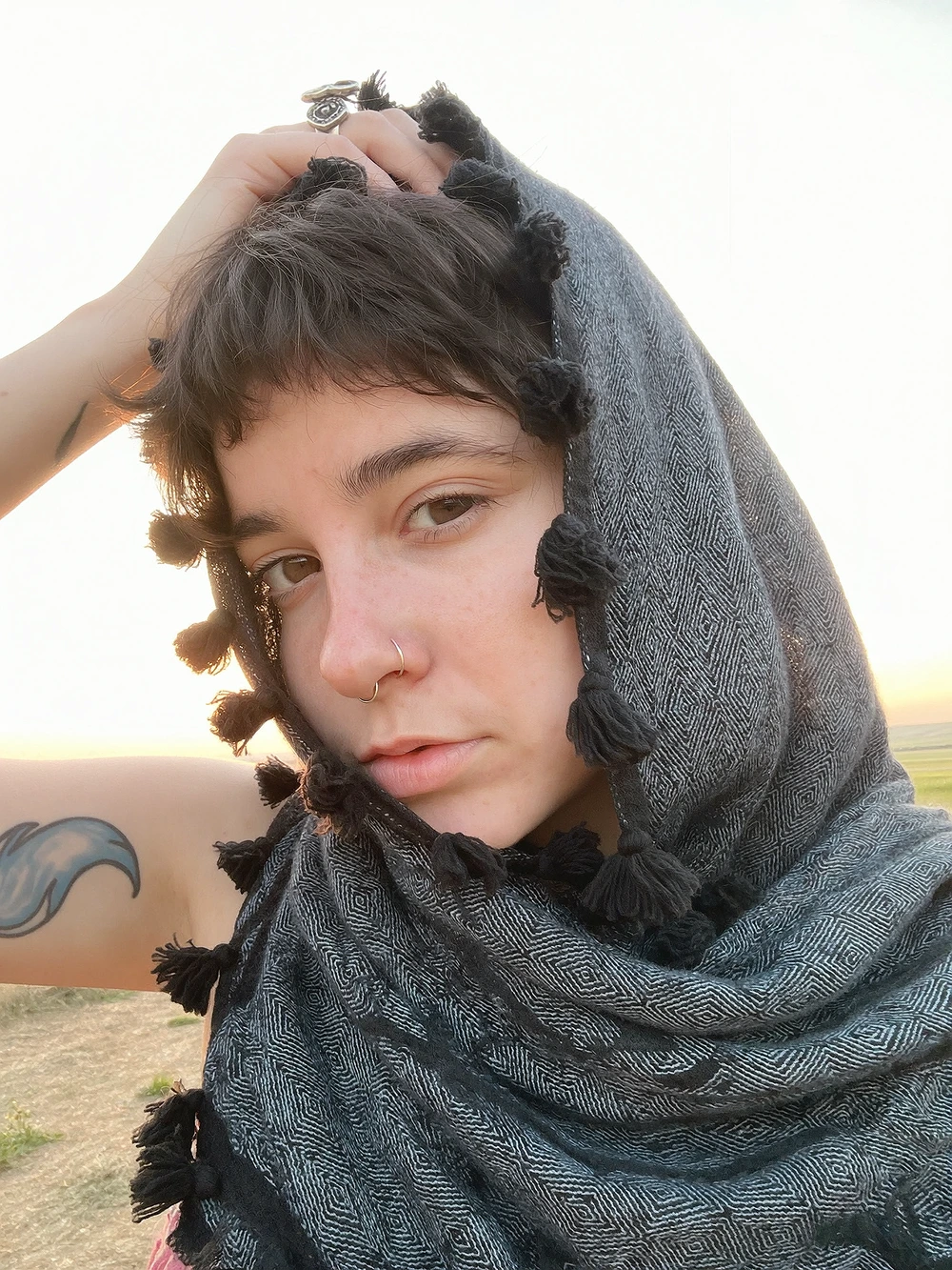 Outdoor model sample with dark hair and a scarf